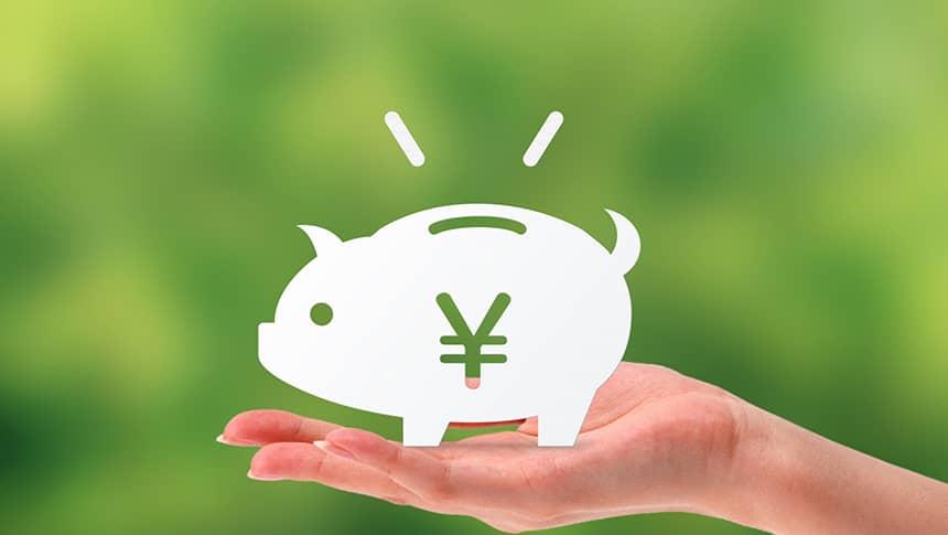 手のひらの上のブタさん貯金箱